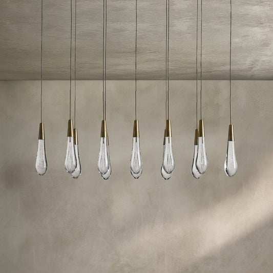 Lamer Lighting Aura Cascade Linear Chandelier - Seeded Glass Raindrop Pendant Lighting 36.75"/50"/60"/70" - Background Shot