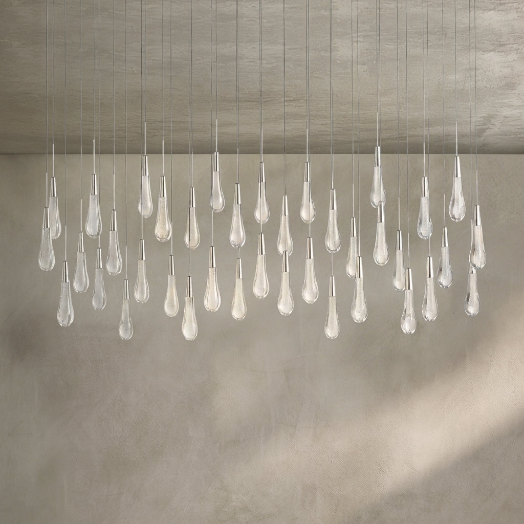 Lamer Lighting Aura Cascade Linear Chandelier - Seeded Glass Raindrop Pendant Lighting 36.75"/50"/60"/70" - Background Shot