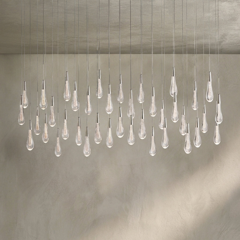 Lamer Lighting Aura Cascade Linear Chandelier - Seeded Glass Raindrop Pendant Lighting 36.75"/50"/60"/70" - Background Shot