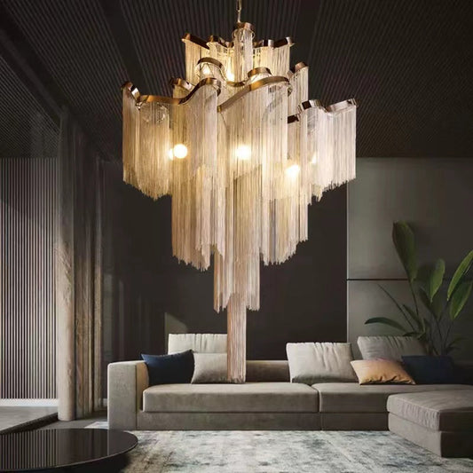 Lamer Lighting Aura Cascade Stainless Steel Tassel Chandelier - dramatic American stairwell with soaring ceiling