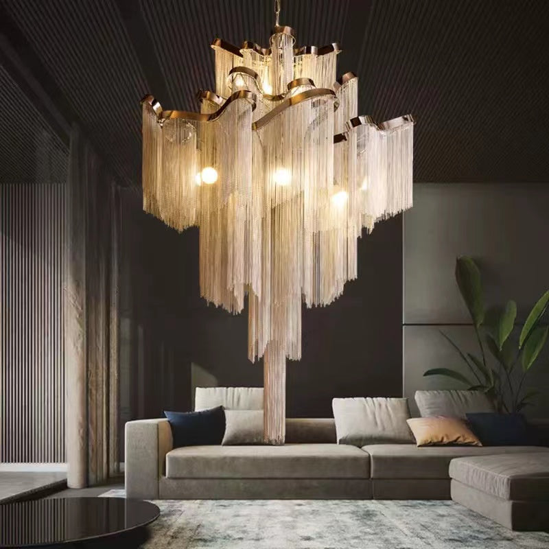 Lamer Lighting Aura Cascade Stainless Steel Tassel Chandelier - American transitional great room with cathedral ceiling