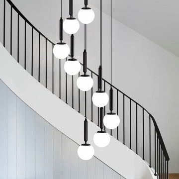 Lamer Lighting Grand Luminous Spiral Iron & Glass Pendant - elegant American entryway with arched doorway