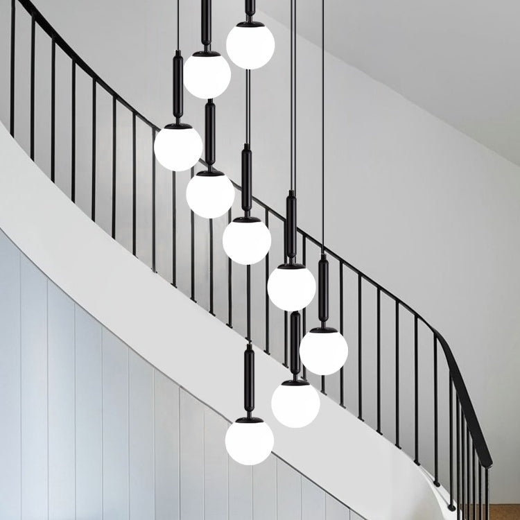 Lamer Lighting Grand Luminous Spiral Iron & Glass Pendant - dramatic American stairwell with soaring ceiling