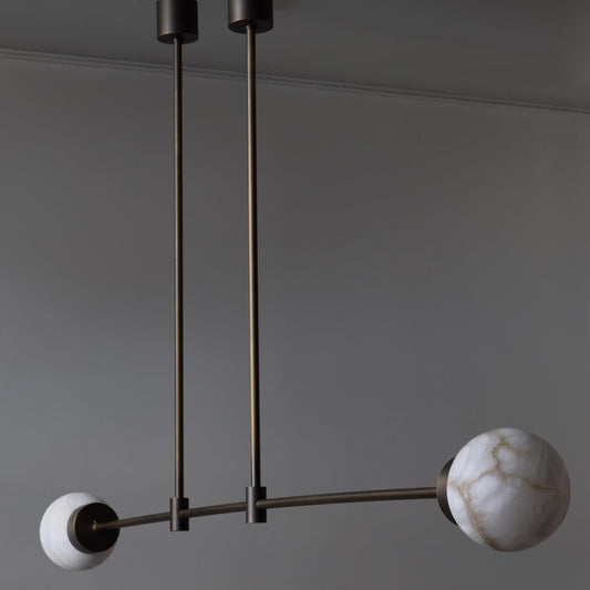 Brass and Alabaster Globes Asymmetrical Line Chandelier