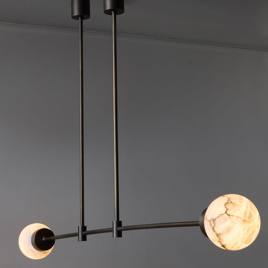 Brass and Alabaster Globes Asymmetrical Line Chandelier