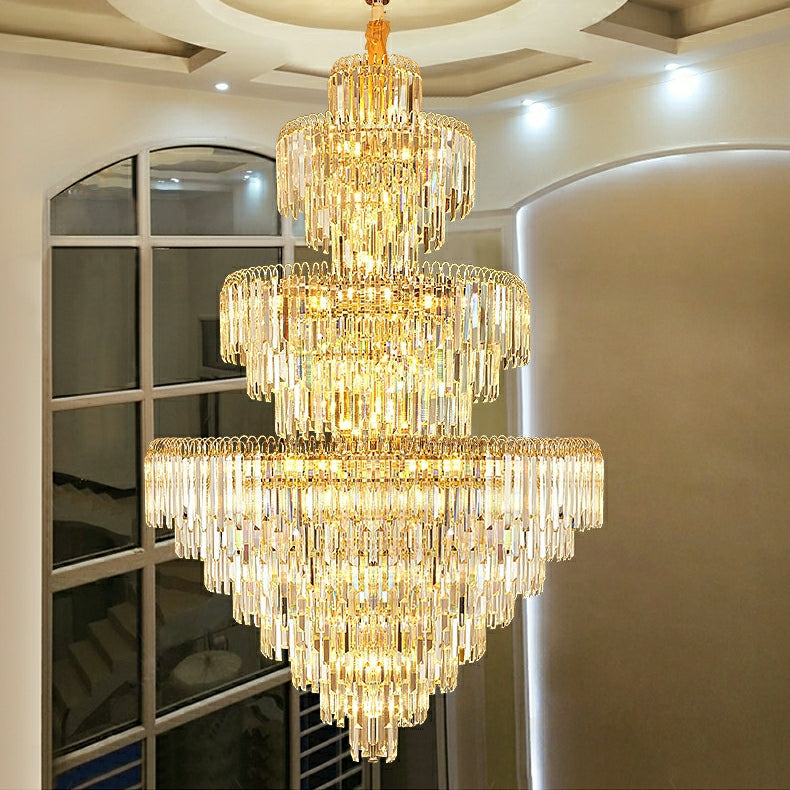 Lamer Lighting Grand Radiance Round K9 Crystal Chandelier - dramatic American stairwell with soaring ceiling